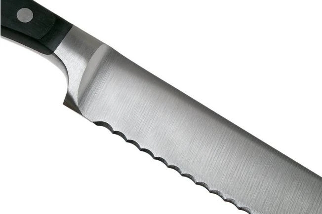 Wüsthof Classic Serrated Carving Knife 23 Cm, 1040100923 4 Wüsthof Classic Serrated Carving Knife 23 Cm, 1040100923 - Image 4